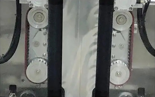 פירוט מכונת אריזה של פאוץ' - גלגל מושך תיק מסונכרן